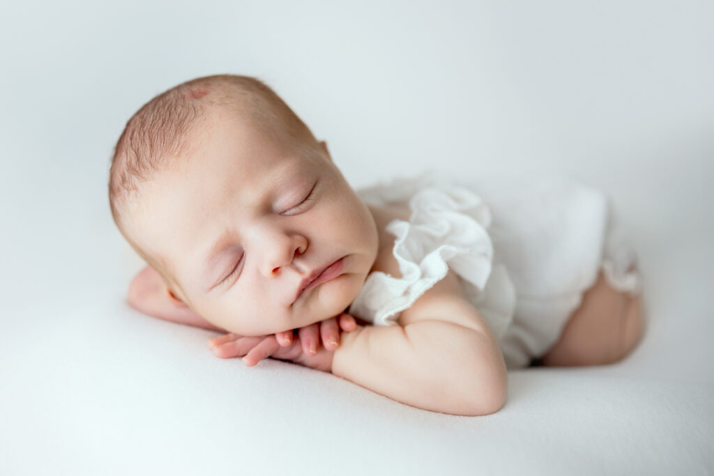 Sleeping newborn, image delivered in the private gallery