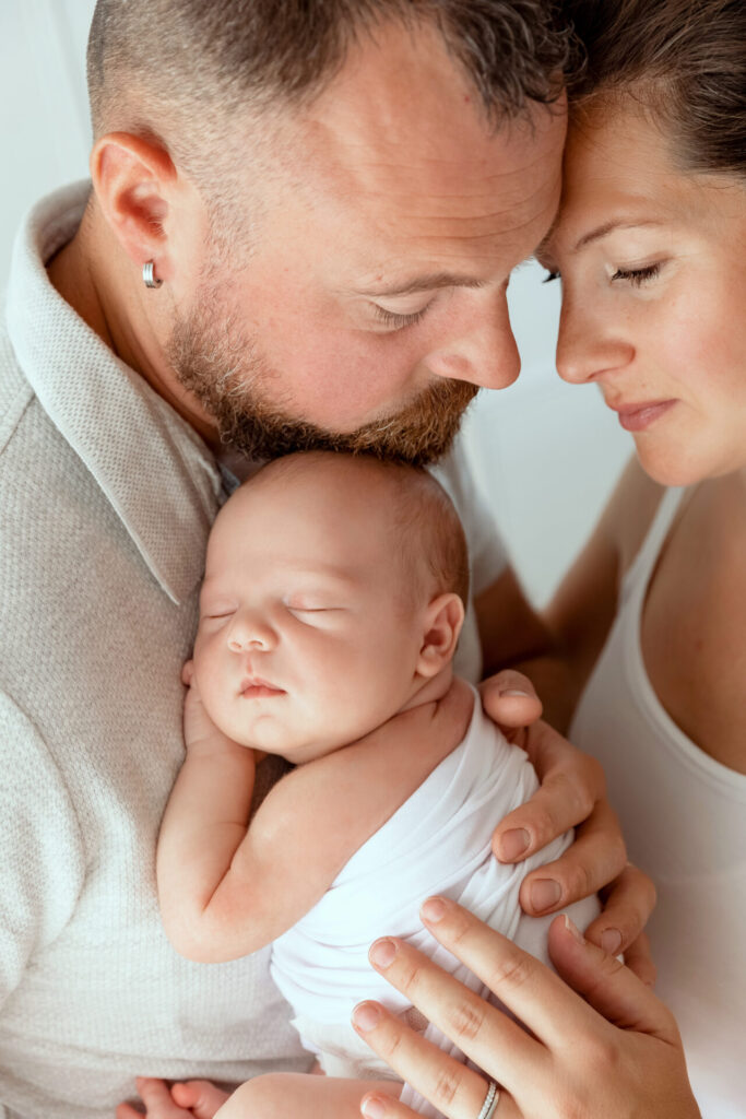 Parents with their newborn, newborn session